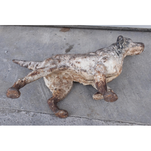 277 - A vintage cast metal retriever dog figure, 35cm long.