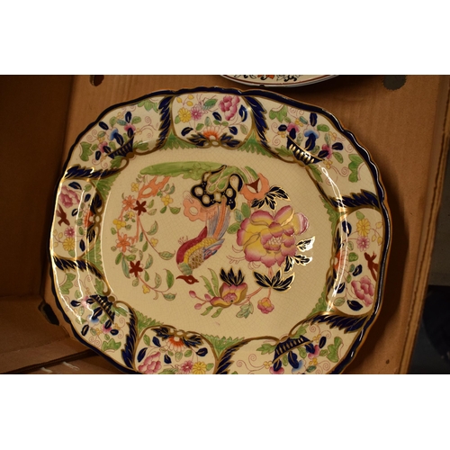 28 - A collection of quality Ashworth and then Masons ironstone pottery to include chargers, plates and a... 