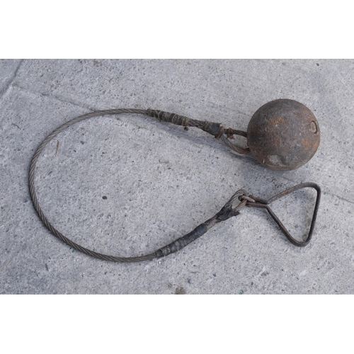 280 - A vintage metal ball and chain for the hammer throw, presumed to be Scottish, 114cm long.