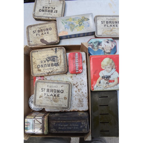 283 - A box of vintage advertising tins of varying sizes and subjects to include Ogdens, Thorn's Toffee et... 