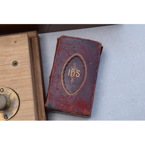 285 - Two wooden engineering boxes, one which houses graduated brass weights and the other including books... 