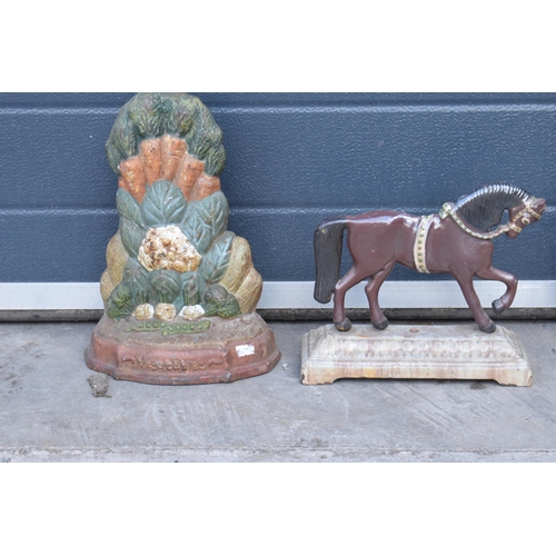 286 - A trio of painted cast metal door stops of varying forms (3).