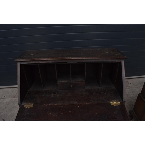 292 - A 1930s brown oak student's bureau, 89x39x103cm tall.