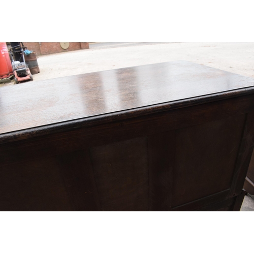 292 - A 1930s brown oak student's bureau, 89x39x103cm tall.