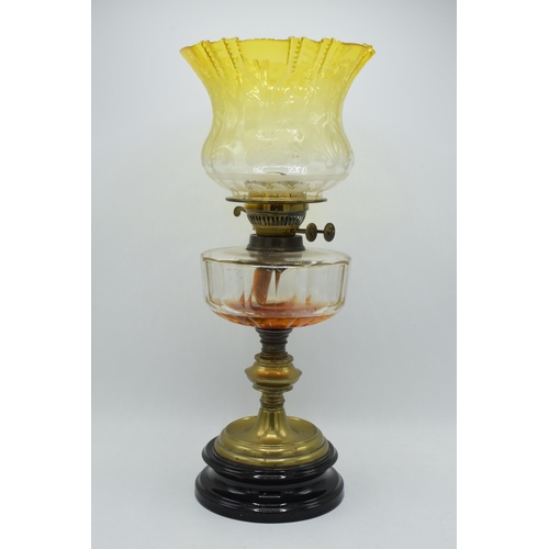 296 - An early 20th century brass oil lamp with etched yellow glass shade, 51cm tall, collection only.