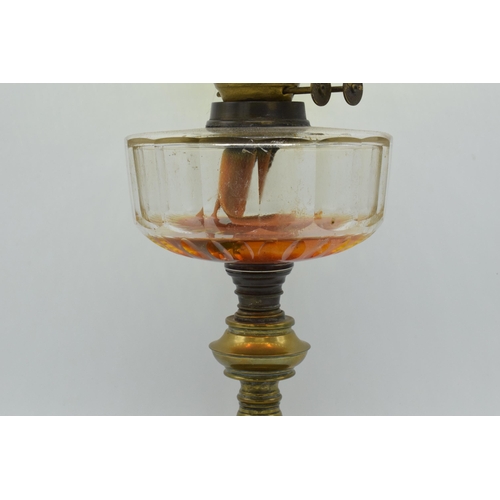 296 - An early 20th century brass oil lamp with etched yellow glass shade, 51cm tall, collection only.