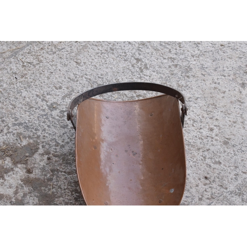 299 - A 19th century French copper and iron log basket on raised on four legs, 49cm long.