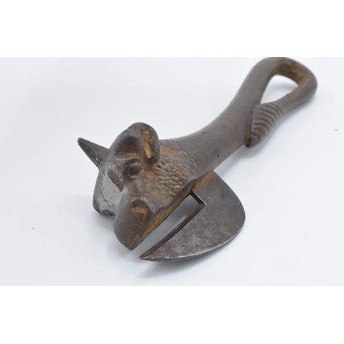 301 - An early to mid 20th century Army Bully Beef cast iron tin opener in the form of a bull