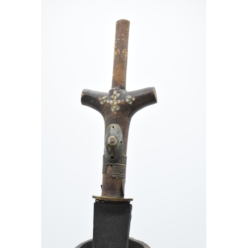 302 - A 20th century sword in scabbard with brass inlay in the wooden handle and steel blade, believed to ... 