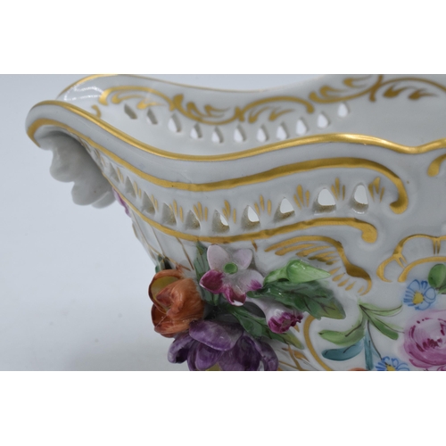 45 - Dresden porcelain pierced decoration basket with moulded flowers and floral decoration, 19.5cm wide.