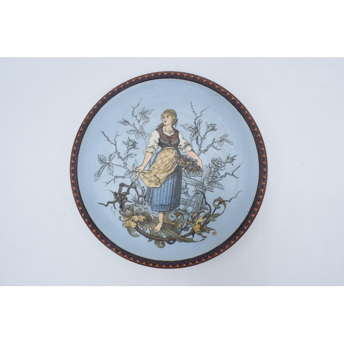 62 - Late 19th century Mettlach (Villeroy and Boch) wall charger after C. Warth decorated with a lady hol... 