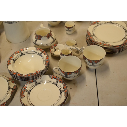 64 - A good collection of Crown Ducal tea and dinner ware in the Orange Tree design to include a teapot, ... 