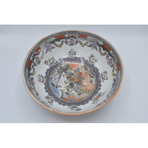 65 - A late 18th / early 19th century English pottery bowl depicting oriental scenes, 29.5cm diameter, 13... 