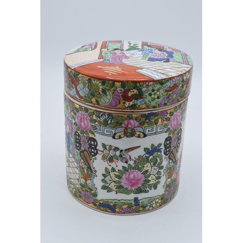 72 - A 20th century Chinese enamelled decoration lidded barrel jar, 6 character mark to base, 16cm tall.