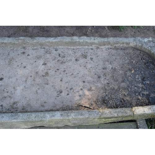 322 - A large 19th century sandstone salting trough / shallow sink with two rounded corners. Approximately... 