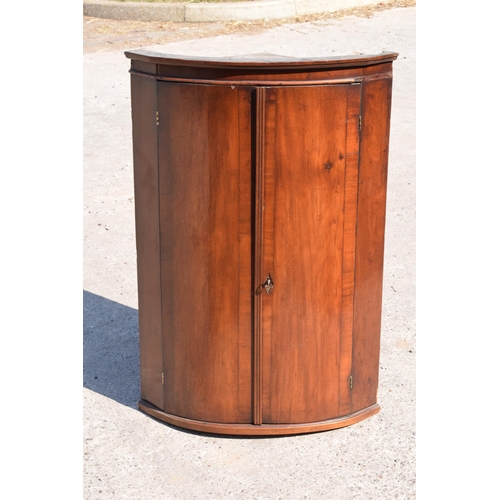 326 - A 19th century mahogany corner cupboard with shelves to interior, 96cm tall.