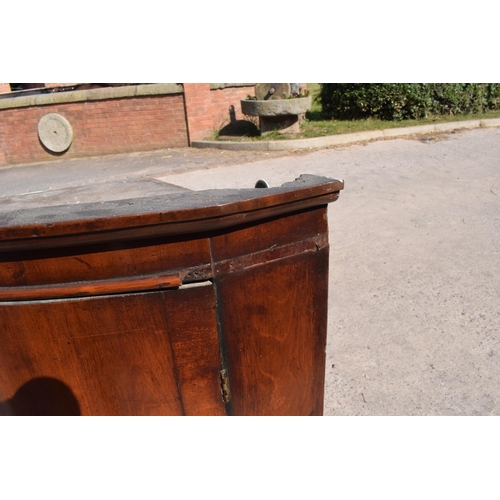 326 - A 19th century mahogany corner cupboard with shelves to interior, 96cm tall.