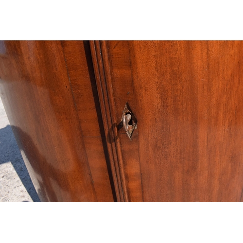 326 - A 19th century mahogany corner cupboard with shelves to interior, 96cm tall.