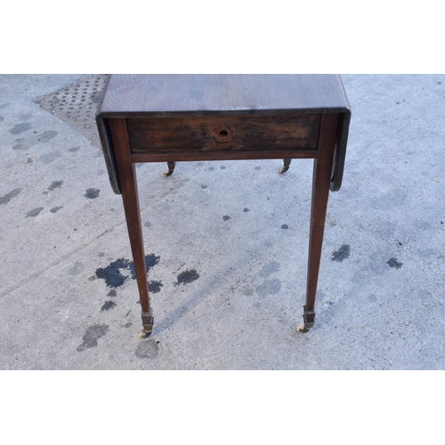 327 - A late 19th century Pembroke table on casters with single drawer, 82cm wide, 98cm wide when extended... 