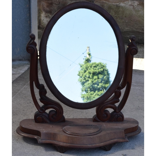 328 - A Victorian 19th century mahogany dressing table swing mirror with central compartment, 65cm tall.