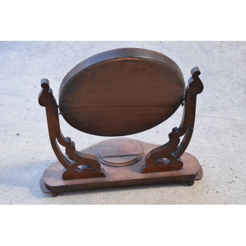 328 - A Victorian 19th century mahogany dressing table swing mirror with central compartment, 65cm tall.