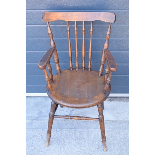 331 - A late 19th century pine (or similar) wooden carver armchair, 93cm tall.