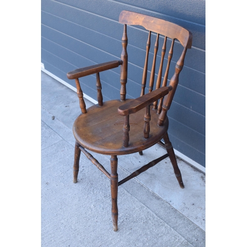 331 - A late 19th century pine (or similar) wooden carver armchair, 93cm tall.