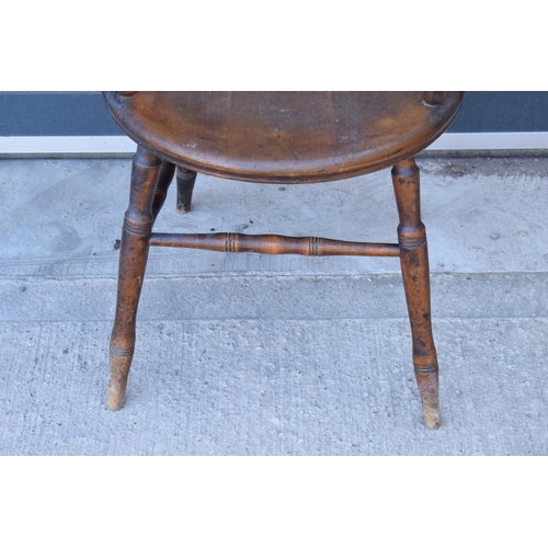 331 - A late 19th century pine (or similar) wooden carver armchair, 93cm tall.