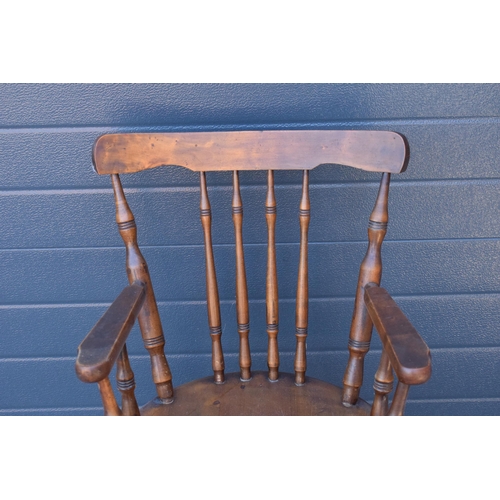 331 - A late 19th century pine (or similar) wooden carver armchair, 93cm tall.