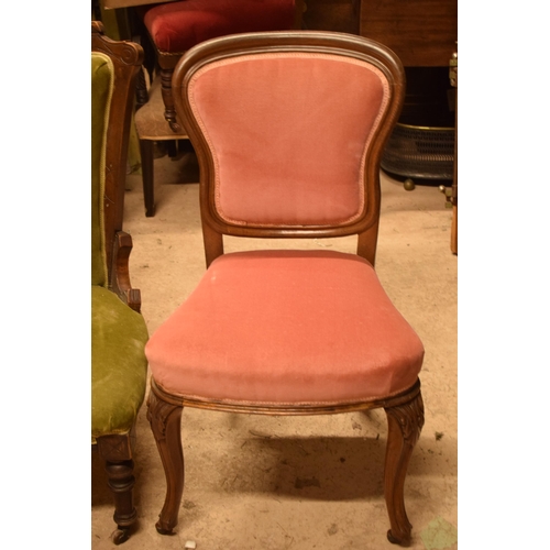 332 - A pair of late 19th century / early 20th century upholstered chairs to include a nursing example and... 