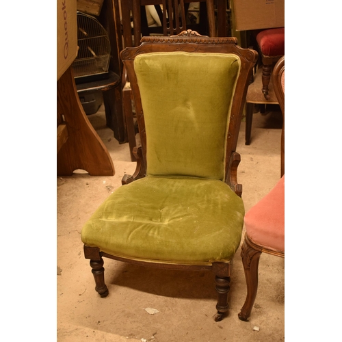 332 - A pair of late 19th century / early 20th century upholstered chairs to include a nursing example and... 