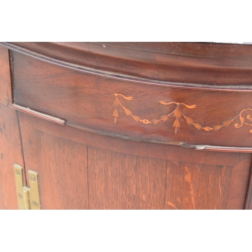 341 - A Georgian oak bow-fronted corner cabinet with inlaid decoration and shelves to interior and brass '... 