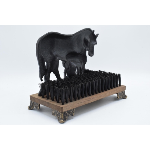 343 - Reproduction cast metal boot brush in the form of a horse and foal, 29cm wide.