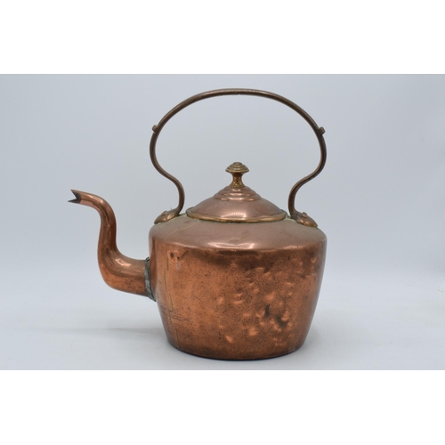 344 - Late Victorian copper kettle, 27cm tall (spout has been soldered).