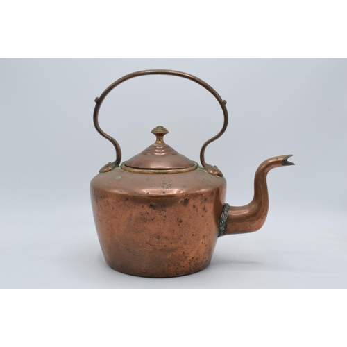 344 - Late Victorian copper kettle, 27cm tall (spout has been soldered).