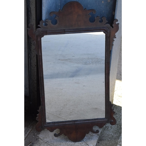 346 - A late 19th century carved wooden wall-hanging mirror, 71cm tall.