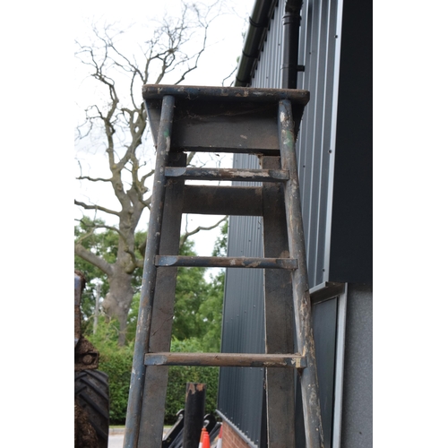 347 - A set of vintage 20th century tall wooden ladders with 'F & E V.L.' markings, 237cm tall when assemb... 