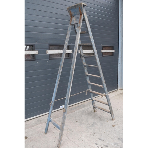 347 - A set of vintage 20th century tall wooden ladders with 'F & E V.L.' markings, 237cm tall when assemb... 