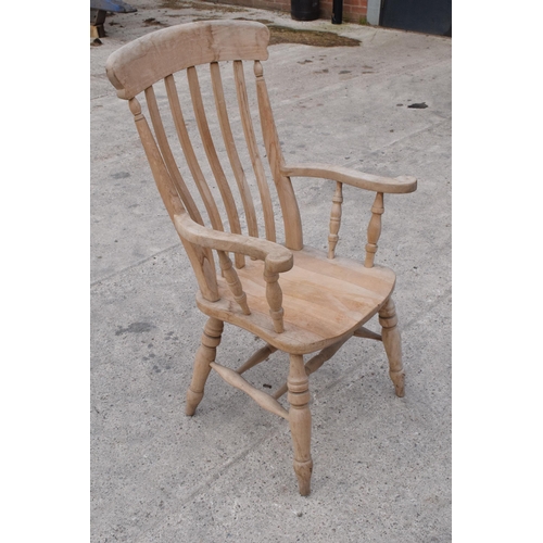 348 - High backed pine carver chair / farm house chair, 113cm tall.