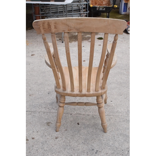 348 - High backed pine carver chair / farm house chair, 113cm tall.