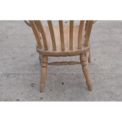 348 - High backed pine carver chair / farm house chair, 113cm tall.