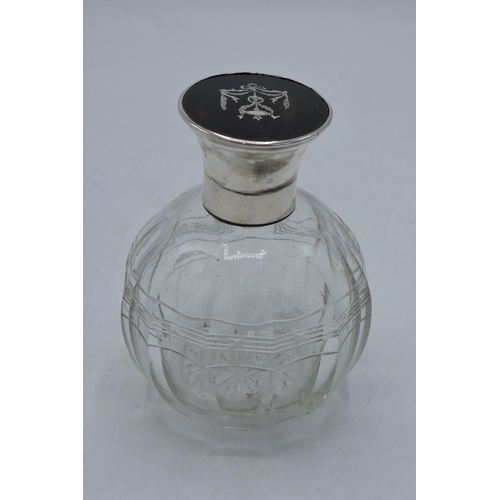 220C - A silver topped globular glass scent bottle with inlaid tortoiseshell lid, London 1916, 12cm tall.