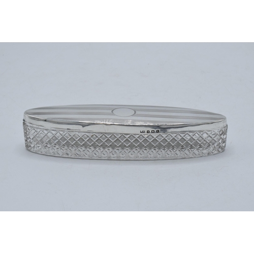 220M - Elongated oval trinket dish with silver lid with engineered decoration, Birmingham 1918, 14cm long.