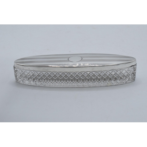 220M - Elongated oval trinket dish with silver lid with engineered decoration, Birmingham 1918, 14cm long.