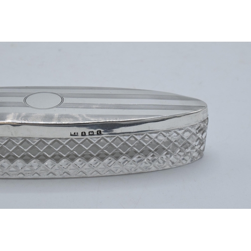 220M - Elongated oval trinket dish with silver lid with engineered decoration, Birmingham 1918, 14cm long.