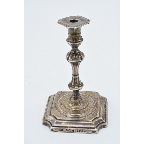 220N - Edwardian silver candlestick, Birmingham 1903, with loaded base. 11.5cm tall.