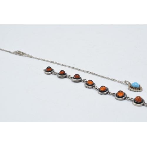 221D - Charles Horner turquoise and silver pendant on silver chain, Chester 1916, together with a silver an... 