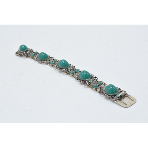 221J - Silver bracelet with green cabochon stones, 28.4 grams, 20cm long.