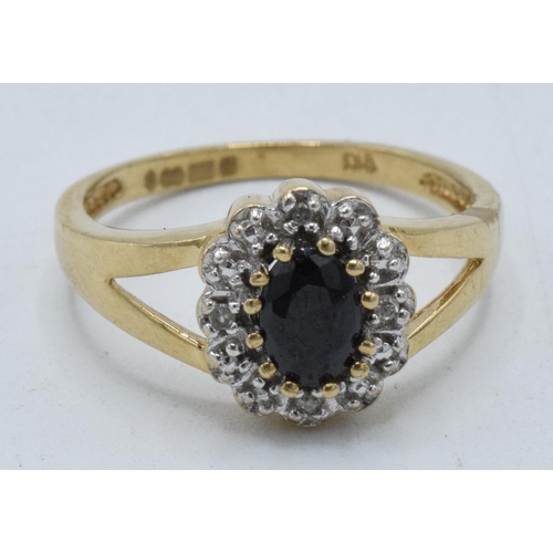 221Q - 9ct gold cluster ring set with diamonds and sapphires, 2.2 grams, size N/O.