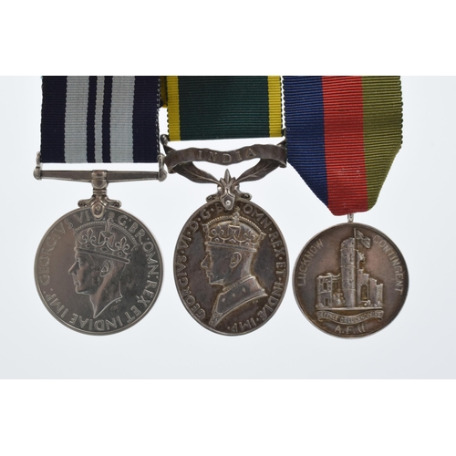 310F - A trio of World War Two medals to include silver India medal (CSM S E BAKER), 1939-1945 medal and Di... 